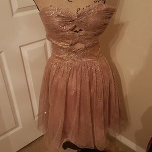 Strapless, backless gold prom dress